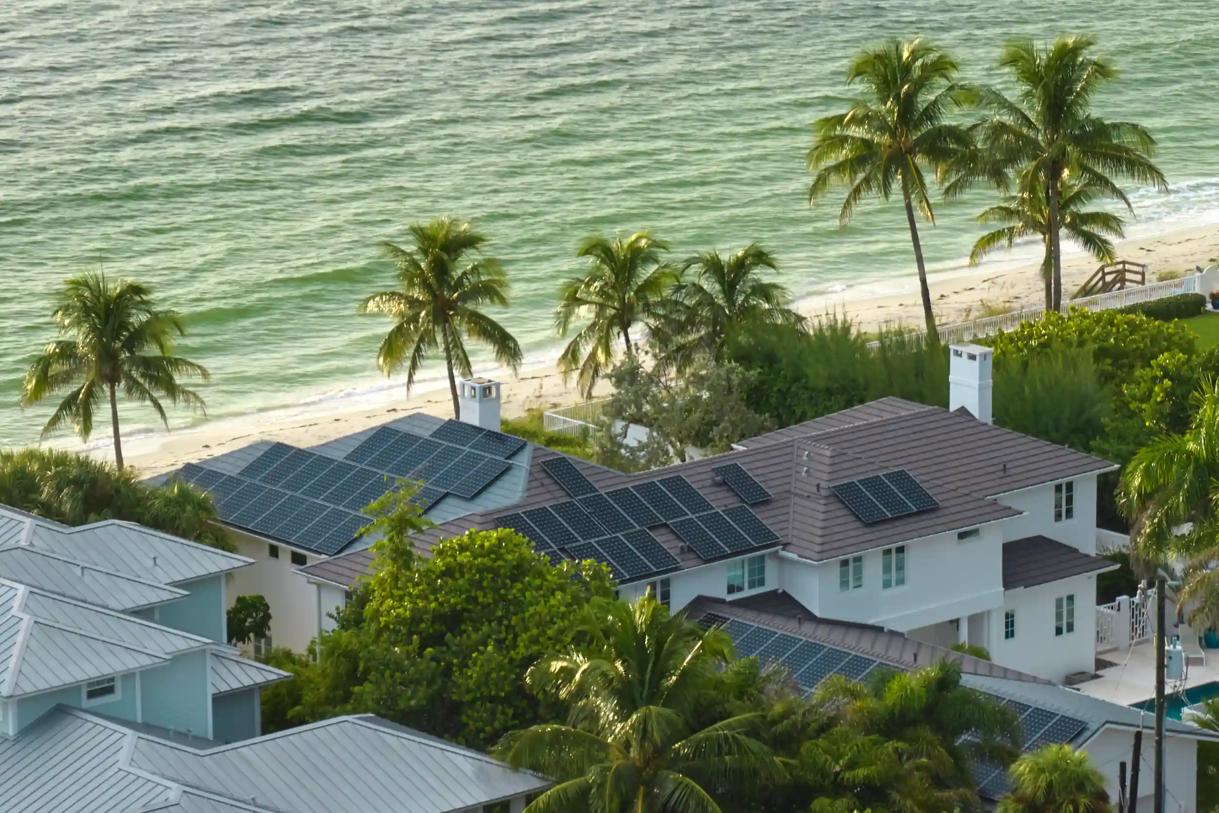 Coastal homes in Emu Park using solar panels for clean renewable energy.